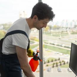 medium-shot-man-cleaning-indoors